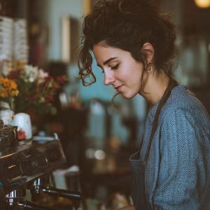 picture_of_cafe_owner_woman_making_expresso